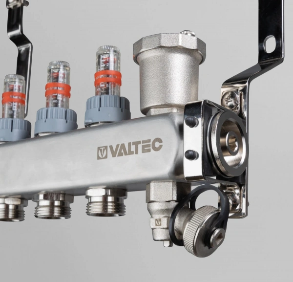 Коллекторная группа VALTEC из НЕРЖ. с регул. клап. и расх., 1"х7 вых. ЕК 3/4" (VTc.579.EMNX.0607)